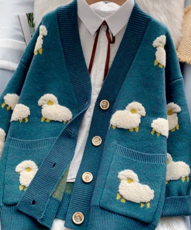 Damski sweter typu kardigan w baranki