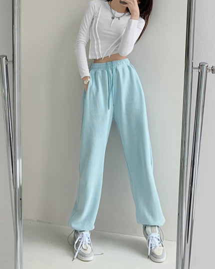 Damskie spodnie dresowe w pastelowych kolorach