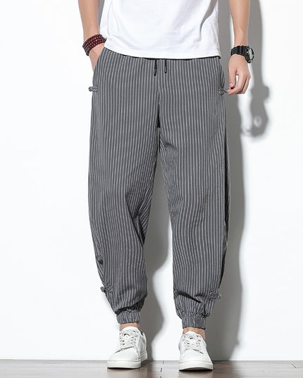 Męskie spodnie treningowe we wzór w paski