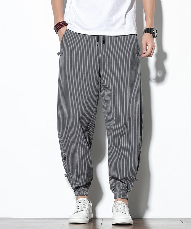 Męskie spodnie treningowe we wzór w paski