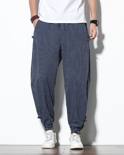 Męskie spodnie treningowe we wzór w paski