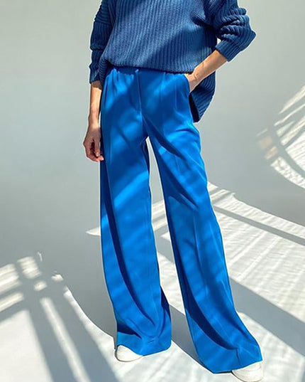 Damskie spodnie chinosy z szerokimi nogawkami podkreślające talię