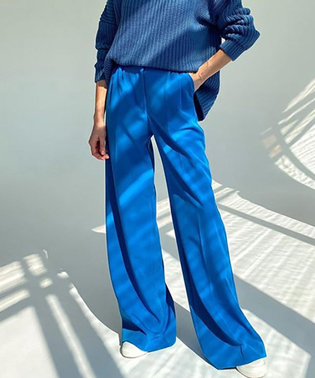 Damskie spodnie chinosy z szerokimi nogawkami podkreślające talię