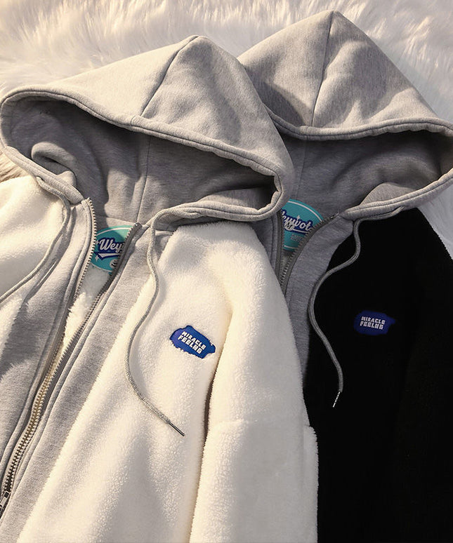 Damska bluza polarowa z kapturem zapinana na suwak