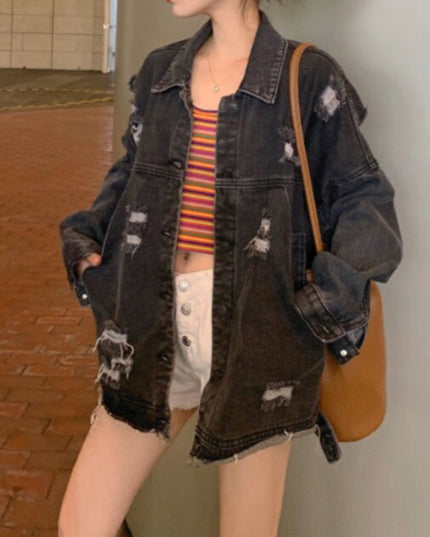 Damska kurtka jeansowa oversize z przetarciami i dziurami