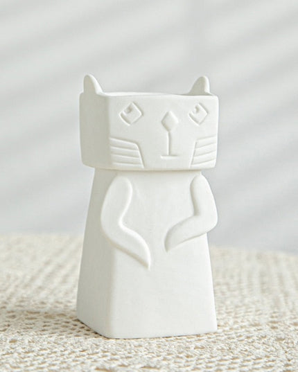 Wazon ceramiczny z motywem twarzy biały