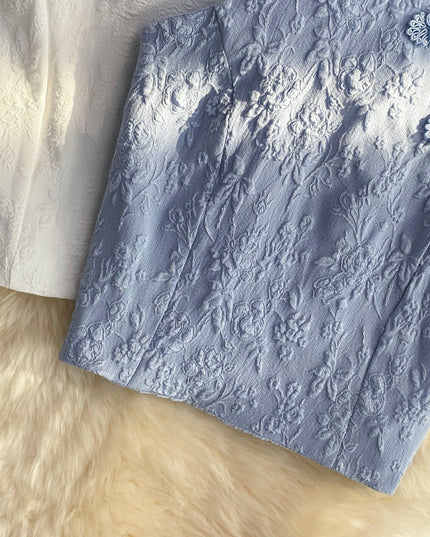 Damski top z fakturą w kwiaty