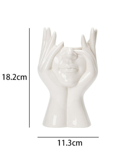 Wazon dekoracyjny w kształcie ludzkiej głowy