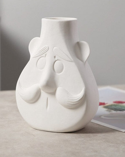 Wazon ceramiczny z motywem twarzy biały