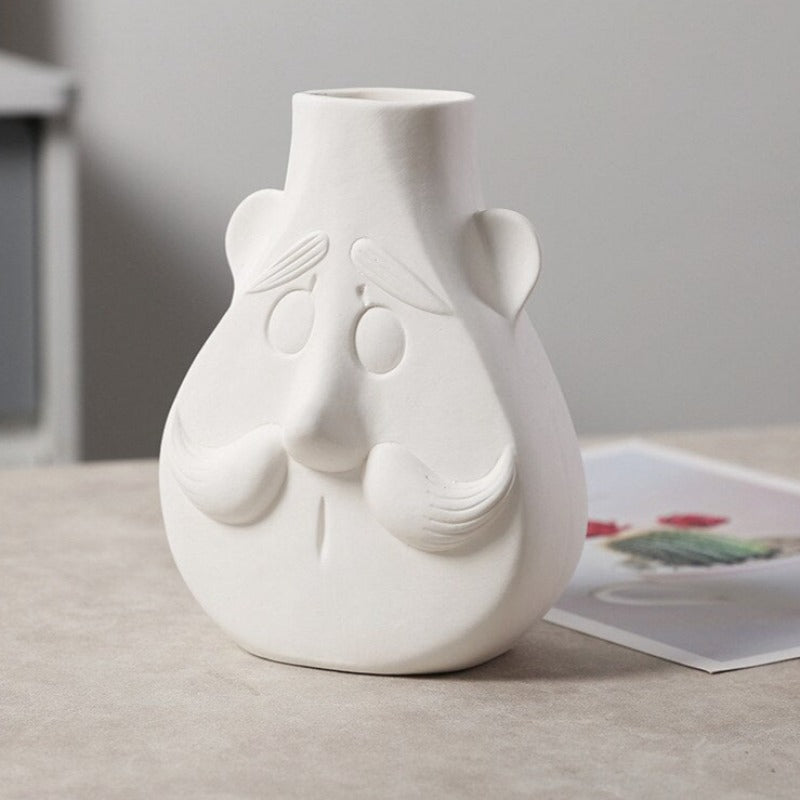 Wazon ceramiczny z motywem twarzy biały