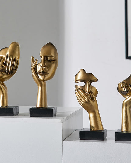 Figurka dekoracyjna twarz w złotych kolorach