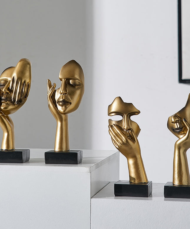 Figurka dekoracyjna twarz w złotych kolorach