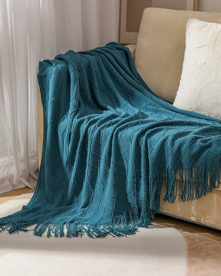 Koc z frędzlami i fakturą w romby