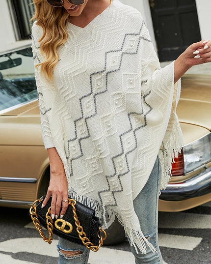 Damski sweter typu ponczo z ozdobnymi perełkami