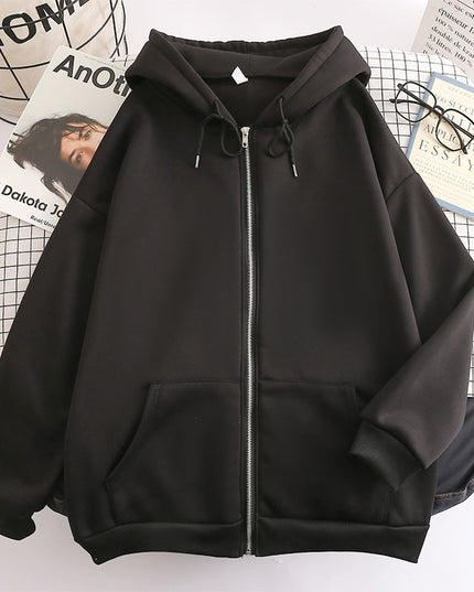 Damska bluza oversize z kapturem zapinana na suwak