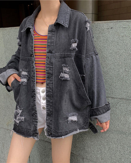 Damska kurtka jeansowa oversize z przetarciami i dziurami