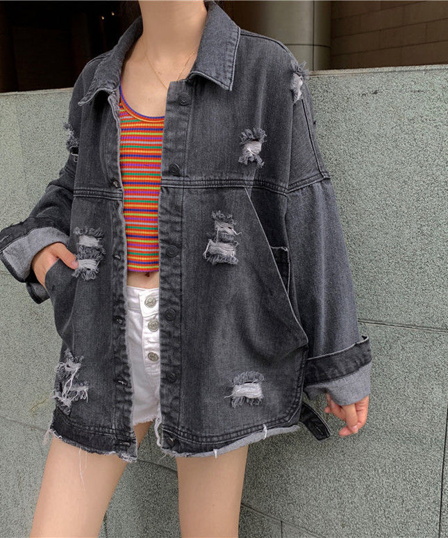 Damska kurtka jeansowa oversize z przetarciami i dziurami