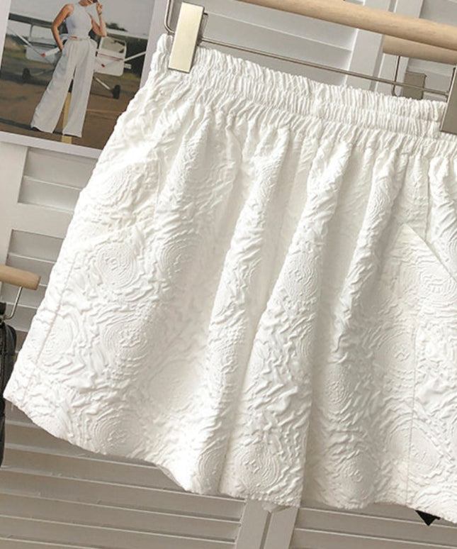 Damskie szorty z fakturą w róże