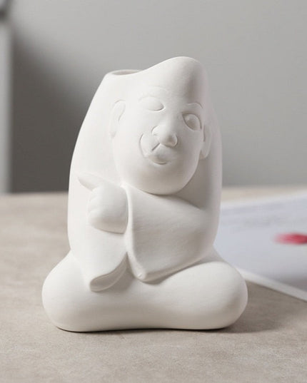 Wazon ceramiczny z motywem twarzy biały