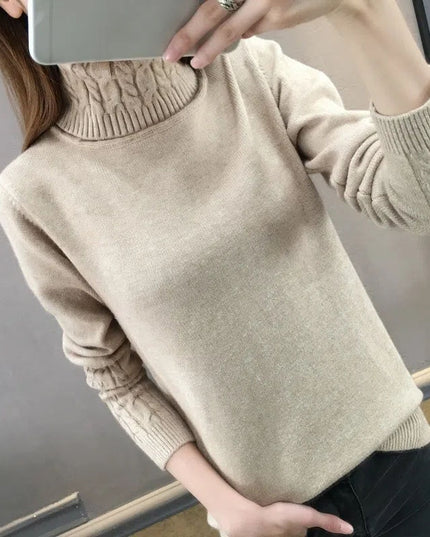 Damski sweter typu golf z plecionką