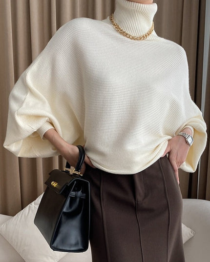 Damski sweter typu golf z bufiastymi rękawami