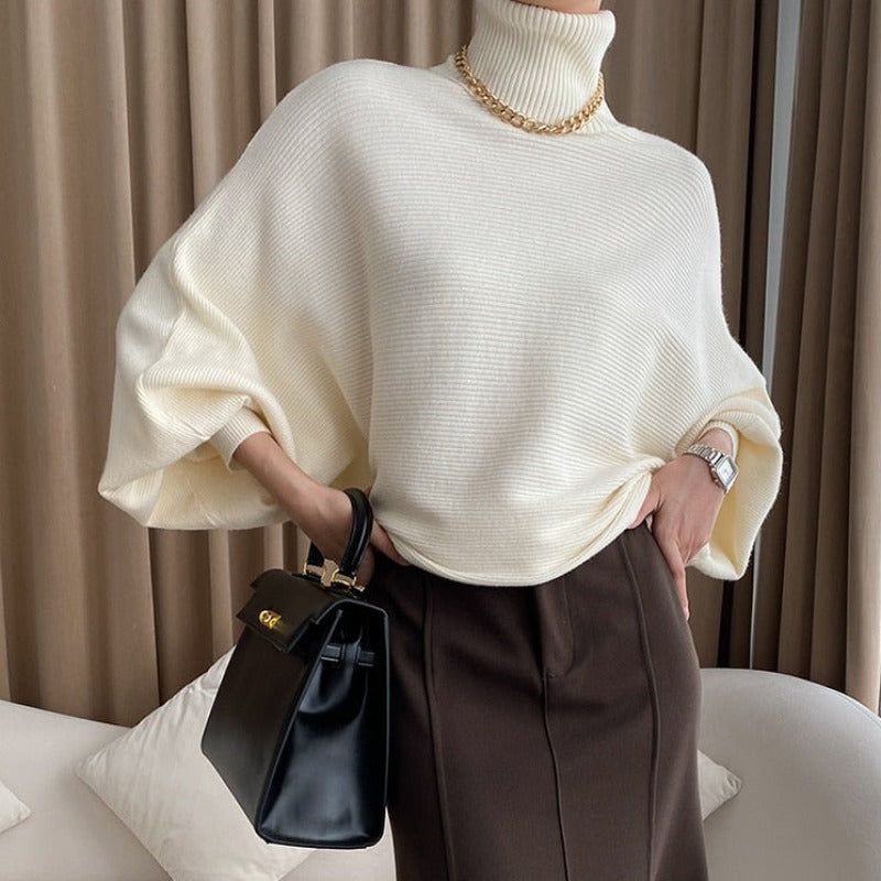 Damski sweter typu golf z bufiastymi rękawami