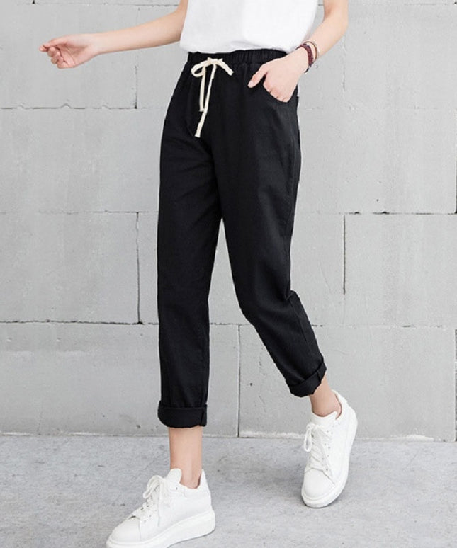 Damskie spodnie chinosy o prostym kroju z wiązaniem