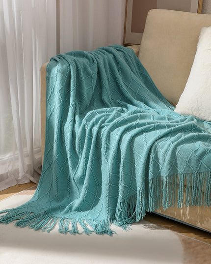 Koc z frędzlami i fakturą w romby