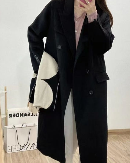 Damski płaszcz oversize długości za kolano