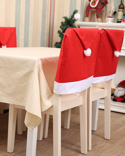 Świąteczny czerwony pokrowiec na krzesło z czapką Mikołaja