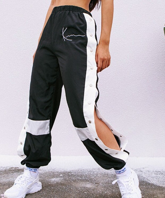 Damskie spodnie cargo rozpinane po bokach