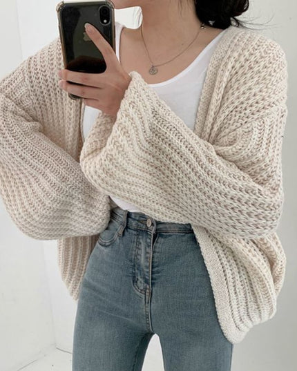 Damski sweter typu kardigan dziergany o kroju oversize