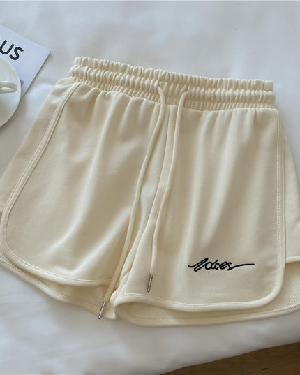 Damskie szorty sportowe z wyszywanym napisem