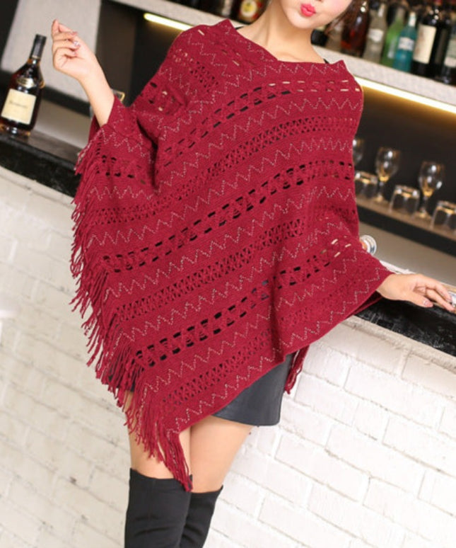 Damski sweter typu ponczo ażurowy z frędzlami