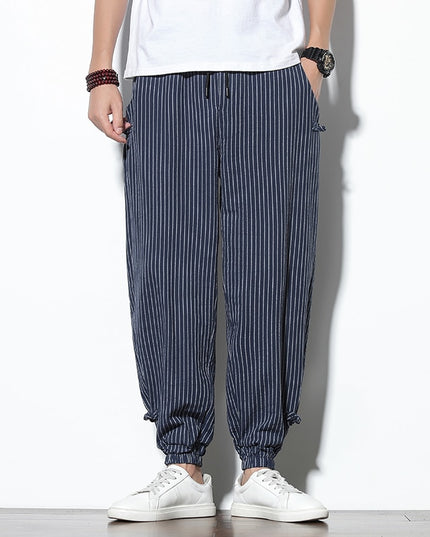 Męskie spodnie treningowe we wzór w paski