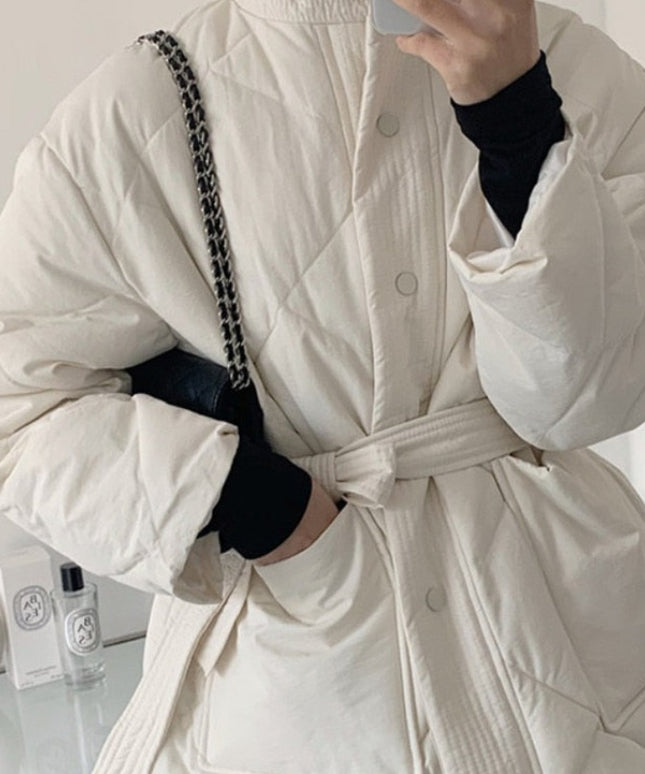 Damska kurtka zimowa wiązana w talii