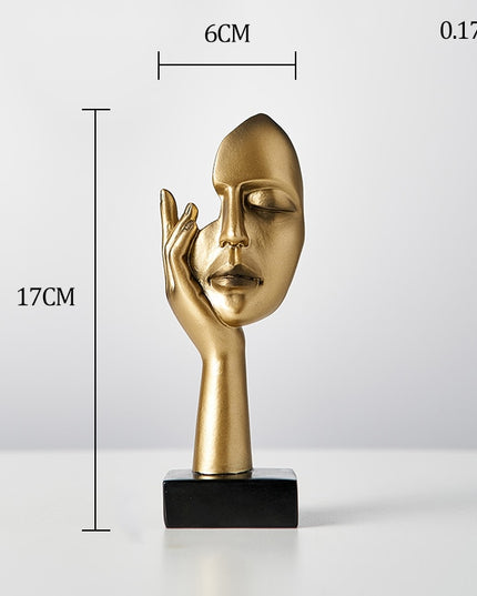 Figurka dekoracyjna twarz w złotych kolorach