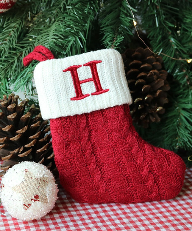 Świąteczna ozdoba wisząca w postaci skarpety z literą H