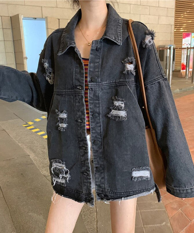 Damska kurtka jeansowa oversize z przetarciami i dziurami