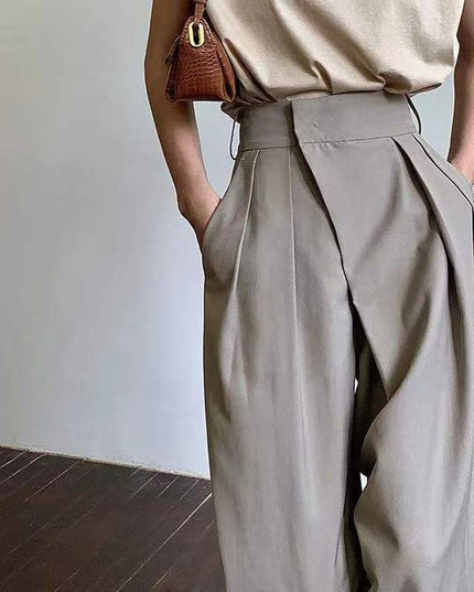 Damskie spodnie chinosy z szerokimi nogawkami i asymetrycznym zamkiem