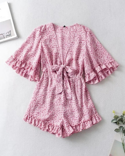 Damski kombinezon w stokrotki z szerokimi rękawami