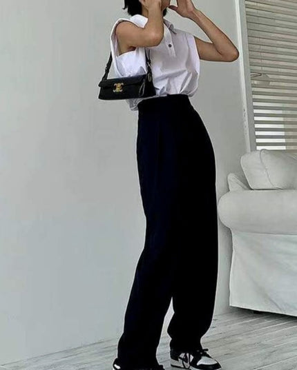 Damskie spodnie chinosy z szerokimi nogawkami i asymetrycznym zamkiem