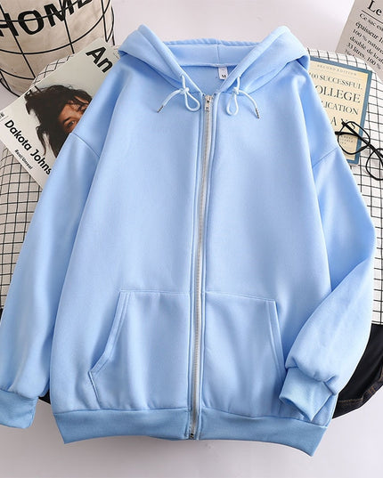 Damska bluza oversize z kapturem zapinana na suwak