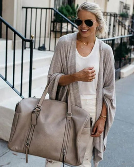 Damski sweter typu kardigan o kroju ponczo