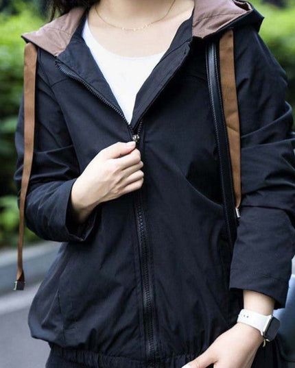 Damska kurtka przejściowa z brązowymi wstążkami