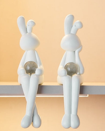 Figurka dekoracyjna królik siedzący w jasnych kolorach