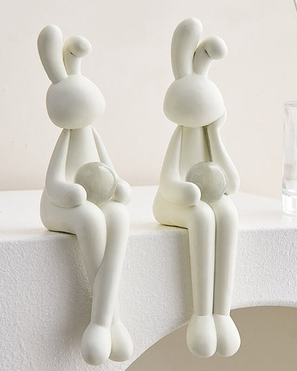 Figurka dekoracyjna królik siedzący w jasnych kolorach