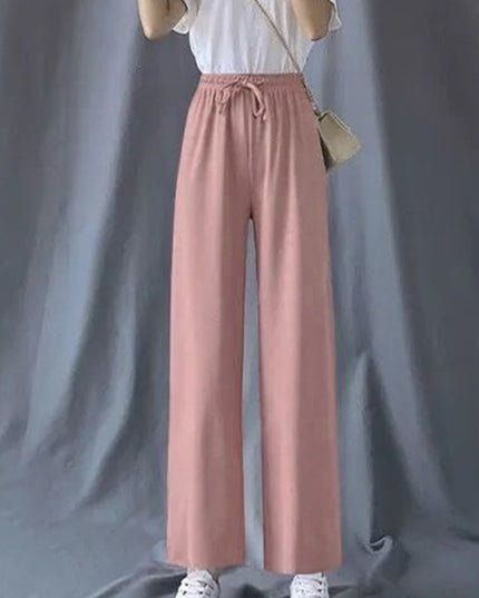 Damskie spodnie z wiązaniem i szerokimi nogawkami