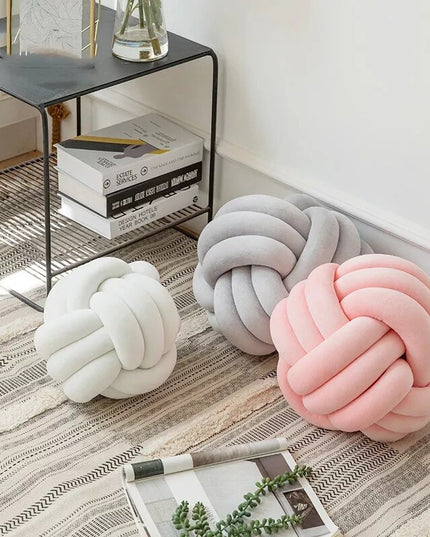 Poduszka dekoracyjna węzeł w pastelowych kolorach