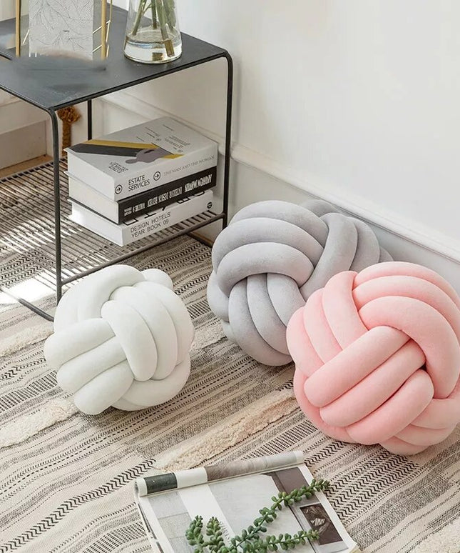 Poduszka dekoracyjna węzeł w pastelowych kolorach